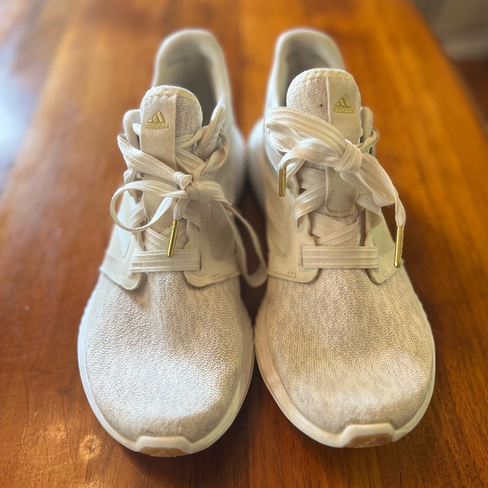 Adidas Edge Lux cream sneakers.